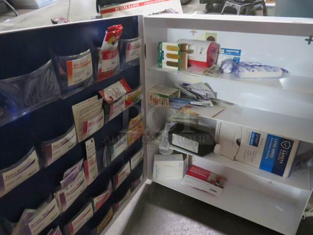 One Metal 1 Door First Aid Kit With Assorted Supplies. 19X6X22 - Image 2 of 2