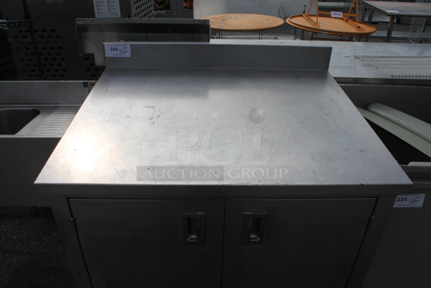 Stainless Steel Commercial Counter w/ Back Splash, Under Shelves and 2 Doors. - Image 2 of 3