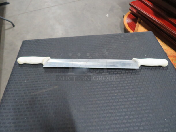 One Dexter Double Handle Knife.  - Image 1 of 1