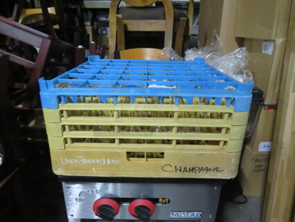 One 36 Hole Yellow/Blue Dishwasher Rack.