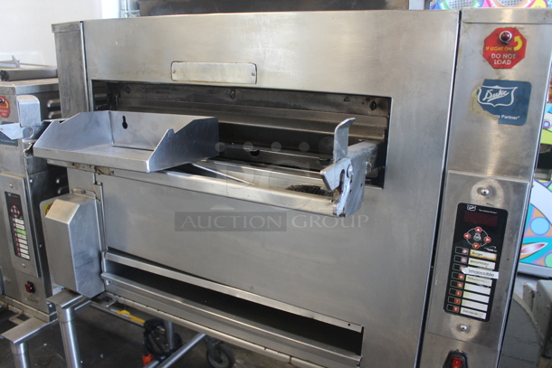Duke Stainless Steel Commercial Natural Gas Powered Charbroiled Burger Grill on Commercial Casters. - Image 4 of 9