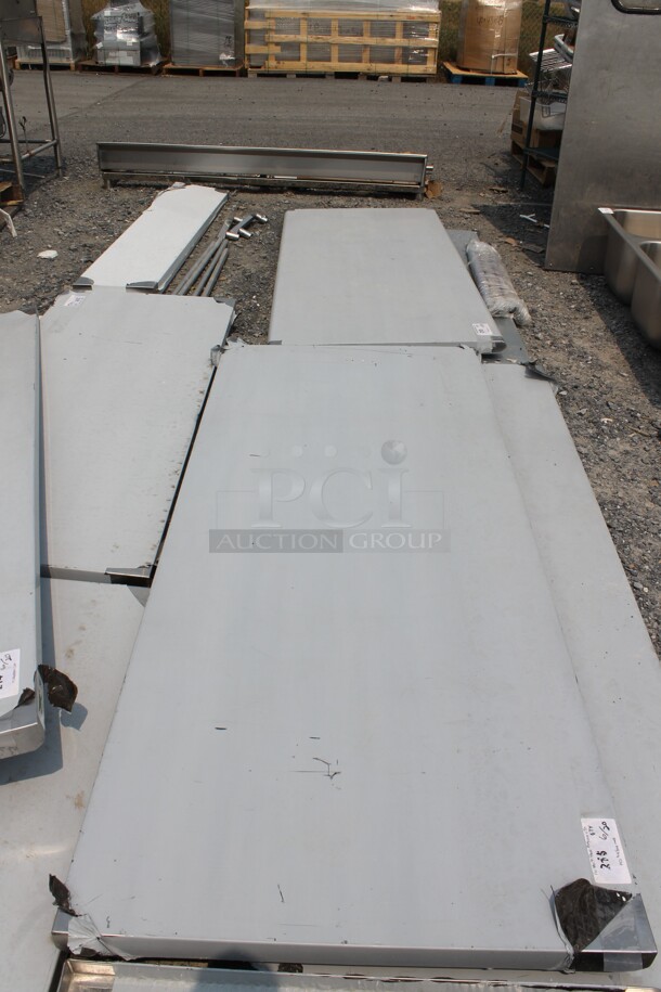 BRAND NEW SCRATCH AND DENT! Regency 600FWT3072 Commercial Stainless Steel Open Base Folding Work Table - Image 2 of 4