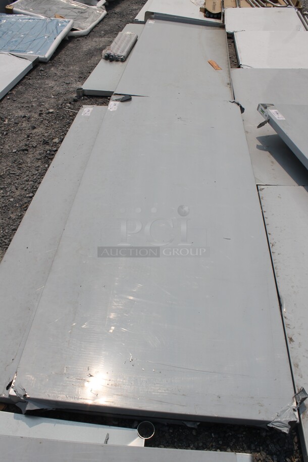 BRAND NEW SCRATCH AND DENT! Regency 600FWT3072 Commercial Stainless Steel Open Base Folding Work Table - Image 3 of 4