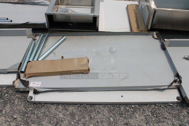 BRAND NEW SCRATCH AND DENT! Regency 600ES3060G Commercial Stainless Steel Disassembled Equipment Stand With Galvanized Undershelf And Legs. - Image 1 of 5