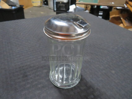 One Lot Of 13 Sugar Pourers.