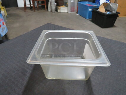 One 1/6 Size 4 Inch Deep Food Storage Container. 