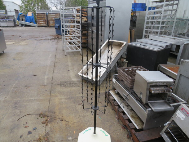 One Snack Club Rotating 4 Row Chip Clip Stand.  - Image 1 of 2