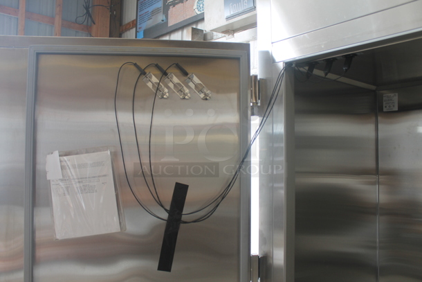 BRAND NEW! 2019 Alto Shaam QC3-100R Stainless Steel Commercial Floor Style Blast Chiller w/ 3 Probes. Comes w/ Remote RivaCold Compressor and Metal Pan Transport Rack. Pan Rack Appears To Be a Little Too Big To Roll In. 115/208-230 Volts, 1 Phase. Stock Picture Used as Gallery Picture - Image 10 of 12