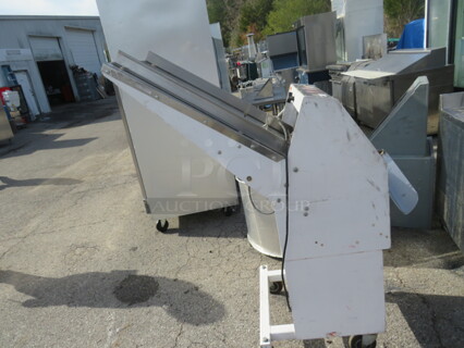 One Berkel Floor Model Bread Slicer On Casters. 115 Volt. Model# GMB1/2. 24X48X61