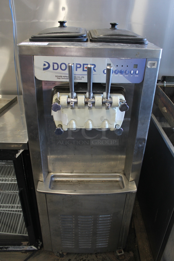 Donper Stainless Steel Commercial Floor Style Air Cooled 2 Flavor w/ Twist Soft Serve Ice Cream Machine on Commercial Casters. 208-250 Volts, 1 Phase. - Item #1074734