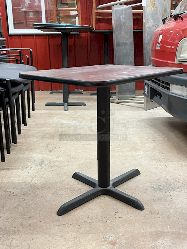 BEAUTIFUL! Lancaster Table & Seating 24" x 30" Reversible Cherry / Black Laminated Standard Height Table Top and Base Kit with 22" Plate - Image 1 of 3