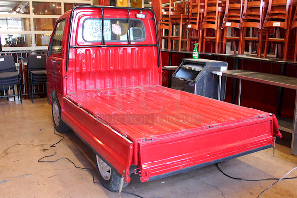 WORK HORSE! 1999/2000 Diahatsu Hijet S210P Pick-Up/Flatbed Truck. 64875Km / 40311 Miles - Runs Perfectly! 5-Speed Manual Transmission, 4 Wheel Drive, 600CC 3 Cylinder, Fuel Injected, Bed Converts From Pick-Up Truck To Flat Bed. Includes Spare Tire. Minor Rust On Flat Bed Panels - Driver side mirror needs to be re-attached. Includes All Original Paperwork. Made In Japan. - Image 9 of 12