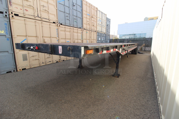 ROAD READY!! 40FT Steel Flatbed Tailer, 4 Wheels. 40FTx96".    VIN# 070F1283; Year 1970; Manufacturer Pike Trailer; Type Flatbed; Steel Construction; Length x Width 40' x 96"; Spring Ride Suspension; Location Single Fixed Axle; Tire Size LP 22.5; Wheel Construction Steel; Wheel Type Budd - Image 2 of 10