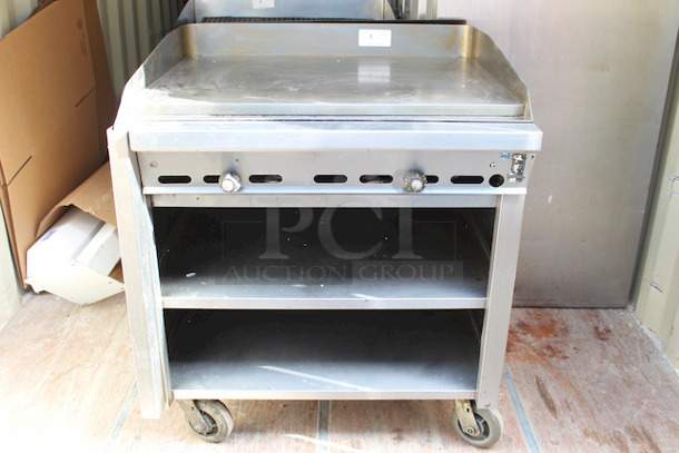 AMAZING! Montague 36-8 Legend 36" Heavy Duty Gas Range With 36" Fry Top & Open Cabinet Base On Commercial Casters With Removable Grease Trap. 36x37x42 - Image 1 of 8