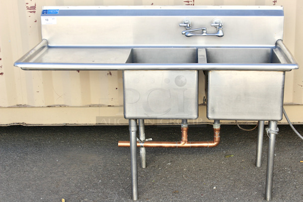 OUTSTANDING! 62” (2) Compartment Sink With Drainboard And Plumbing. Compartment Dimensions 17x23x12. Overall Dimensions 62x28x44 - Image 1 of 5