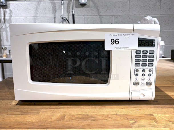 NICE! Rival RGTM701 0.7 Cu. Ft. 7000 Watt Digital Microwave Oven.  - Image 1 of 3