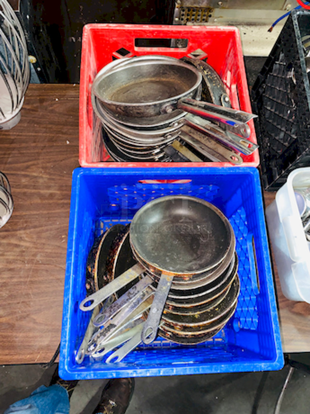 HUMONGOUS! Lot of Buffets/Catering Equipment. 
Includes (2) Crates of individual Frying Pans, (3) Containers of gravy boats, cream dispensers and etc, (1) container of Chefs Knives. 