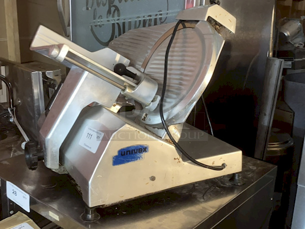 DO NOT PASS THIS BY! Univex 7512 Manual Meat & Cheese Slicer w/ 12" Blade In OUTSTANDINGLY GOOD CONDITION!! Belt Driven, Aluminum, 1/2 hp, WORKING! 120v/20hz/1phase 25"x21-1/2x20-3/4 87lbs - Image 6 of 6