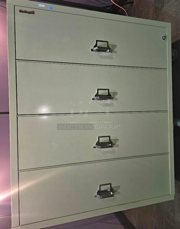 Fire King fireproof lateral File safe with 4 drawers. A very heavy, well-made piece in great condition! Minor scuffs or signs of wear may be evident, but still an awesome safe to protect important items and/or documents. Measures 53” H x 44.5” W x 22” D.  

 - Image 2 of 3