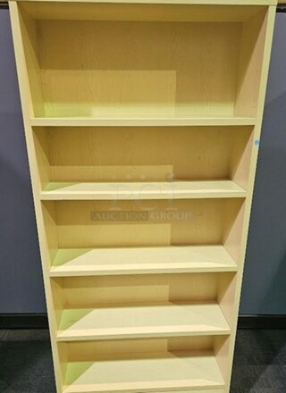 Oak standing bookcase in like-new condition! Has five shelves. 72"H x 36"W x 12"D. 

 