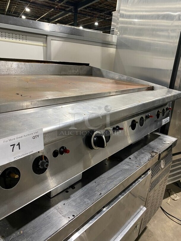 Nice! Garland Stainless Steel Commercial Countertop Natural Gas Powered Flat Top Griddle on Stainless Steel! - Image 2 of 6
