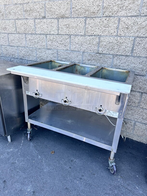 Late Model Duke E303 44 inch Hot Food Table w/ (3) Wells & Cutting Board, On Casters 115v/1ph Working  - Image 5 of 6