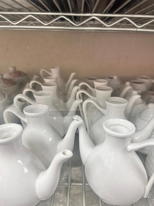 One Lot Contains Percaline Milk Dispensers  - Image 1 of 3