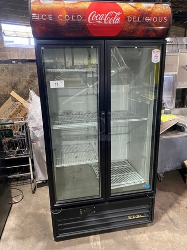 True Commercial Refrigerated 2 Door Reach In Cooler Merchandiser! With View Through Doors! Poly Coated Racks! Model: GDM35EMLD SN: 7569052 115V 60HZ 1 Phase! Working When Removed!