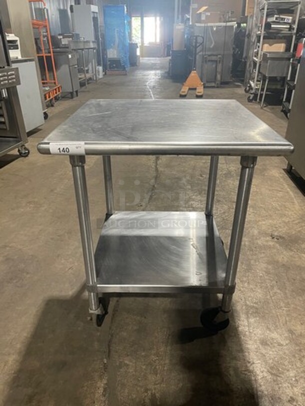 Tabco Solid Stainless Steel Worktop Table! With Back Splash! With Storage Space Underneath! On Casters!