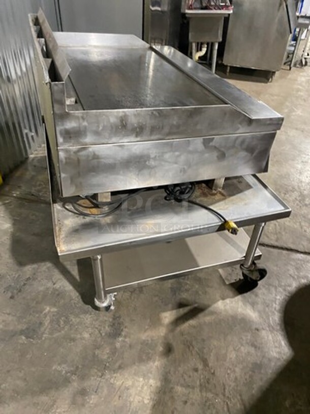 Garland Commercial Countertop Gas Powered Flat Griddle! With Back And Side Splashes! On Equipment Stand! With Storage Space Underneath! All Stainless Steel! On Casters! - Image 4 of 10