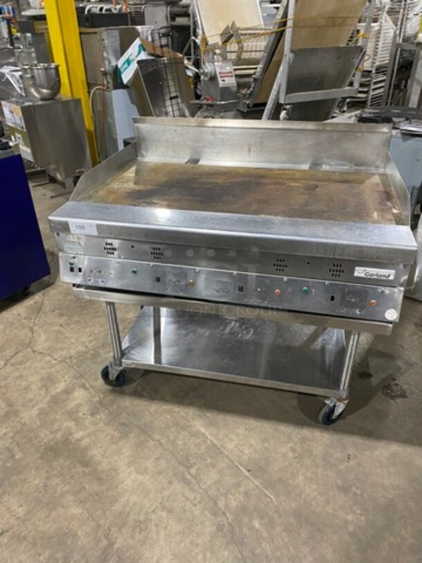 Garland Commercial Countertop Gas Powered Flat Griddle! With Back And Side Splashes! On Equipment Stand! With Storage Space Underneath! All Stainless Steel! On Casters!