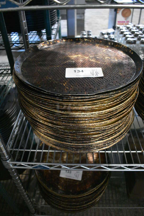 48 Metal Round Perforated Baking Pans. 15.25x15.25x1. 48 Times Your Bid!