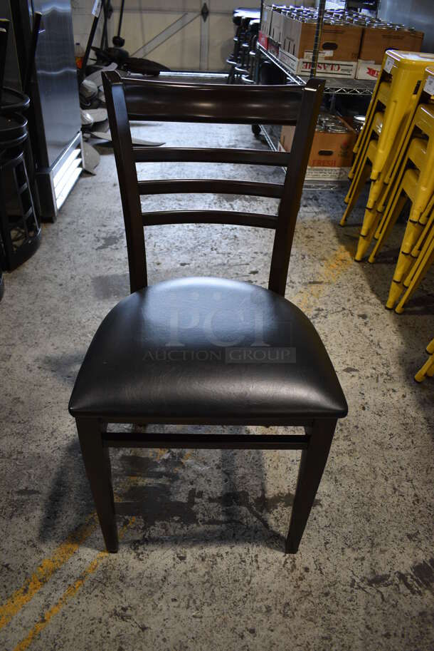 4 Dark Brown Wood Pattern Dining Chairs w/ Black Seat Cushion. 16x16x36. 4 Times Your Bid!