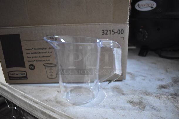 5 Boxes of 6 BRAND NEW Rubbermaid Clear Poly Pitchers. One Box Missing 3. 6x3.5x5. 5 Times Your Bid!