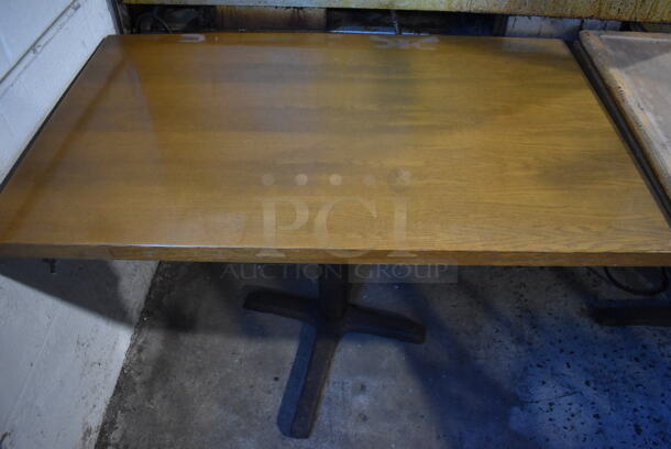 2 Wood Pattern Tables on Black Metal Table Base. 46x28x29.5. 2 Times Your Bid!
