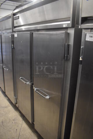 Continental 2F Stainless Steel Commercial 2 Door Reach In Freezer on Commercial Casters. 115 Volts, 1 Phase. 57x34x82. Tested and Working!