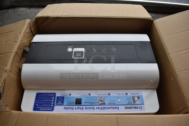 IN ORIGINAL BOX! Pelonis PAD40C1AWT ENERGY STAR 40 Pint Dehumidifier. 120 Volts, 1 Phase. 15x10.5x19 - Image 1 of 5