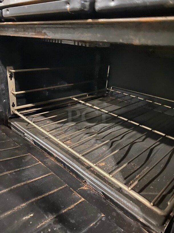 Garland Commercial Natural Gas Powered 6 Burner Stove! With Raised Back Splash! With Oven Underneath! Metal Oven Rack! All Stainless Steel! On Casters! - Image 7 of 8