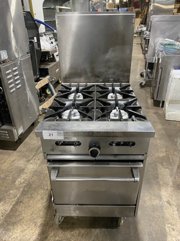 Sunfire Commercial Natural Gas Powered 4 Burner Stove! With Raised Back Splash! With Oven Underneath! All Stainless Steel! On Casters! - Image 1 of 9