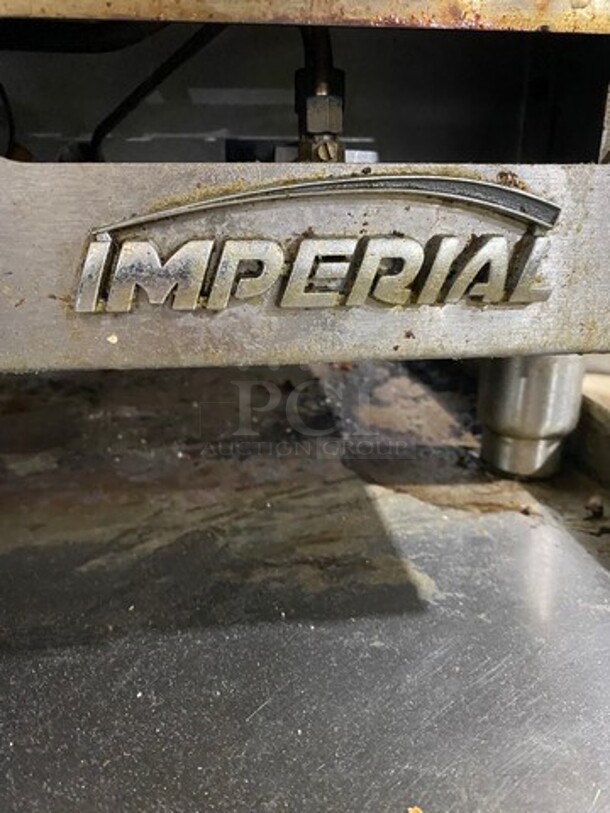 Imperial Commercial Natural Gas Powered Countertop Grill! With Grooved Grill! With Back And Side Splashes! On Legs! On Equipment Stand! With Storage Space Underneath! All Stainless Steel! On Casters! WORKING WHEN REMOVED! Model: IGG48 - Image 8 of 11