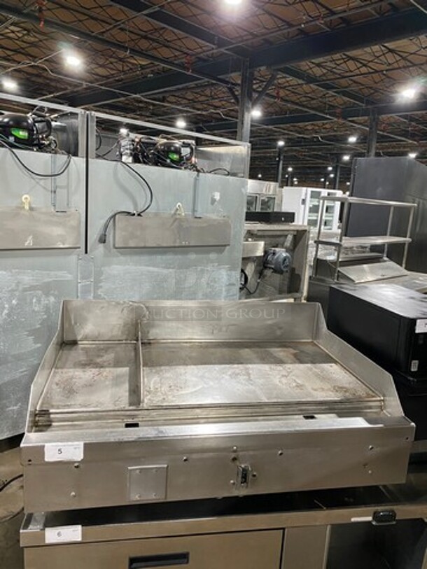 Sweet! Woodstone Commercial Countertop Natural Gas Powered Flat Griddle! With Split Top! With Back & Side Splashes! All Stainless Steel! On Legs! Model: WSPL48364CT00NG! Goes Great With Lot 6! - Image 1 of 9