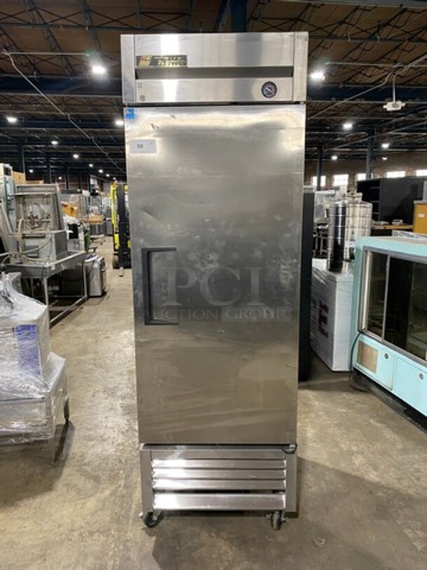 True Commercial Single Door Reach-In Freezer! With Poly Coated Racks! Solid Stainless Steel! On Casters! Model: T23F SN: 7754931 115V 60HZ 1 Phase