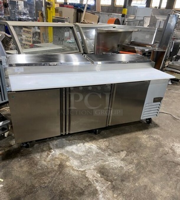 LATE MODEL! 2023 Asber Commercial Refrigerated Pizza Prep Table! With Commercial Cutting Board! With 3 Door Underneath Storage Space! All Stainless Steel! On Casters! Model: APTP93HC SN: 8102860761 115V 1 Phase! Working When Removed!