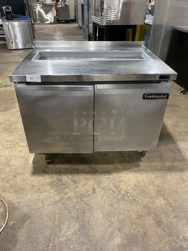 Continental Commercial Refrigerated Sandwich Prep Table! With 2 Door Underneath Storage Space! Poly Coated Racks! All Stainless Steel! On Casters! Model: SW4812 SN: 15766668 115V 60HZ 1 Phase