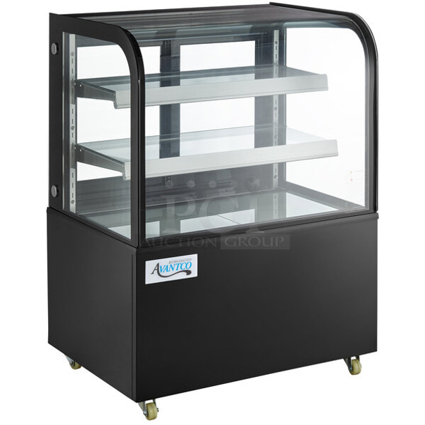 BRAND NEW SCRATCH AND DENT! Avantco 193BC36HCB Metal Commercial Floor Style Curved Glass Black Refrigerated Bakery Display Case Merchandiser on Commercial Casters. 110-120 Volts, 1 Phase. Cannot Test Due To Cut Power Cord