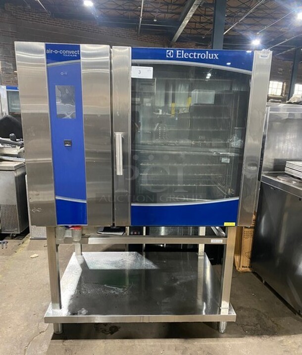 2015 Electrolux Air-O-Steam Electric Touch Line Combi Convection Oven! With View Through Door! Metal Oven Racks! With Open Underneath Storage Space! All Stainless Steel! On Legs! MODEL AOS102EKM1 SN:54810001 208V 3PH  - Image 1 of 11