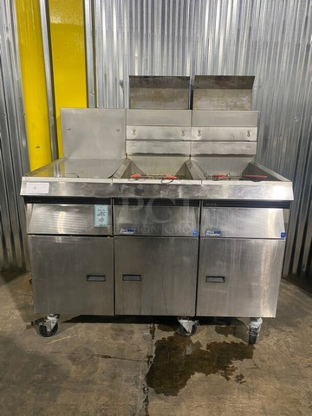 NICE! Pitco Frialator Commercial Natural Gas Powered 2 Bay Deep Fat Fryer! With Left Side Dumping Station! With Backsplash! All Stainless Steel! With Metal Frying Baskets! Model F14RS-V Serial G99E013020! On Casters!