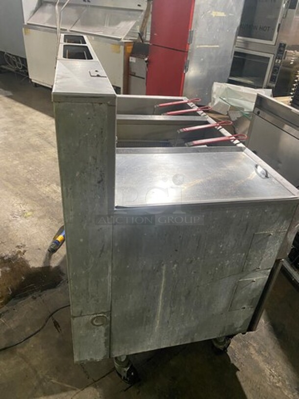NICE! Pitco Frialator Commercial Natural Gas Powered 2 Bay Deep Fat Fryer! With Left Side Dumping Station! With Backsplash! All Stainless Steel! With Metal Frying Baskets! Model F14RS-V Serial G99E013020! On Casters! - Image 4 of 12