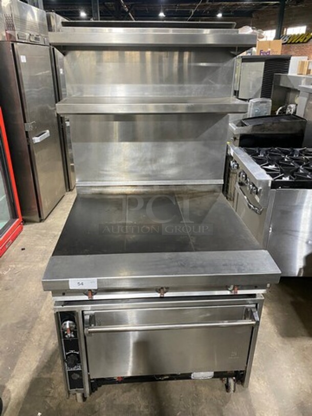Jade Range Commercial Natural Gas Powered French Top/ Hot Plate Stove! With Raised Back Splash With Double Overhead Shelf! With Oven Underneath! All Stainless Steel! On Casters! - Image 1 of 12