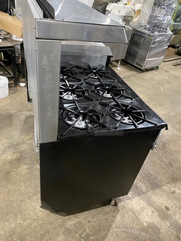 AMAZING! Garland Commercial Natural Gas Powered 6 Burner Split Top With Right Side Flat Griddle! With 2 Full Ovens Underneath! With Back Splash & Overhead Salamander Shelf! All Stainless Steel! With Metal Oven Racks! On Casters!  - Image 4 of 12